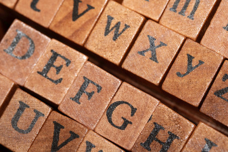 Jumbled up block wood print letters lined up