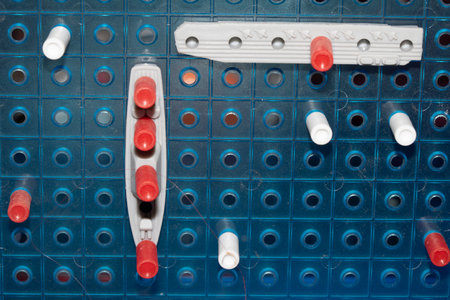 Close up of strategic battleships board game with ships and pegsの写真素材