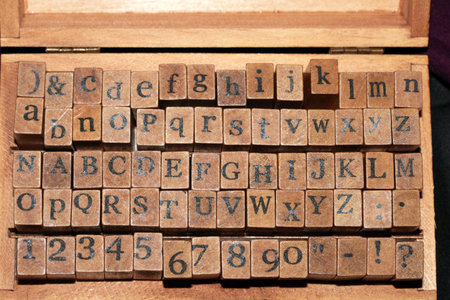 Jumbled up block wood print letters lined upの写真素材