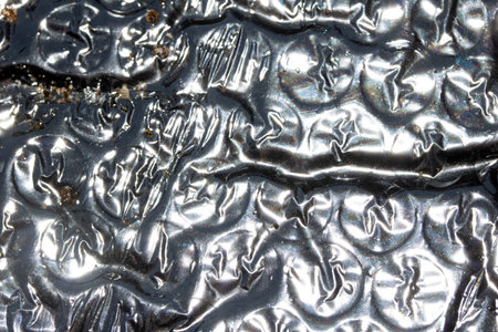 Abstract interesting chrome and paint bubble backgroundの写真素材