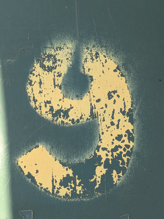 Written Wording in Distressed State Typography Found Ransom Number Nine 9