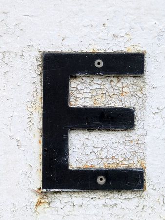 Written Wording in Distressed State Typography Found Letter Eの写真素材