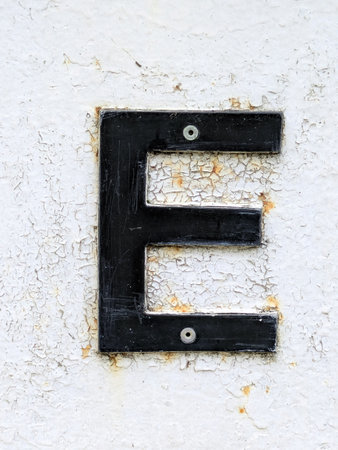 Written Wording in Distressed State Typography Found Letter Eの写真素材