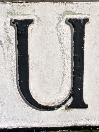 Written Wording in Distressed State Typography Found Letter Uの写真素材