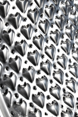 Abstract metallic industrial steel or metal heart and swirl shapeの写真素材