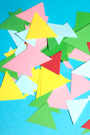 Simple Paper Card Primary Colour Triangle Geometric Shapes in Multicolour Rainbow Calm Background