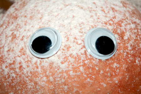 A Funny Freshly Home Made Baked Bread Roll With Googly Wobble Eyesの写真素材