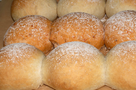 Close up of fresh baked homemade rolls buns breads golden