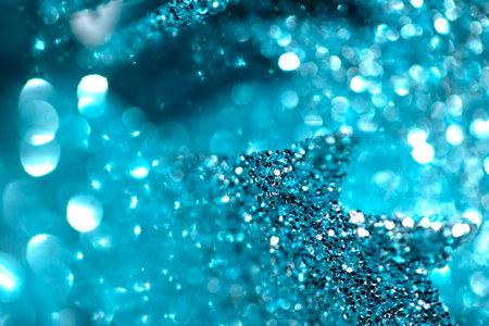 bokeh blue glitter sparkle abstract backgroundの写真素材