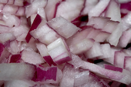 Chopped red onions close up vegetables for cookingの写真素材