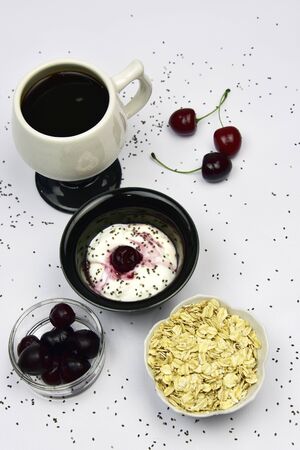 Probiotic yogurt with cherries chia seeds and oatmealの写真素材