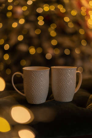 two cups on a Christmas backgroundの写真素材