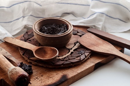 wooden utensils and jam in the kitchenの写真素材
