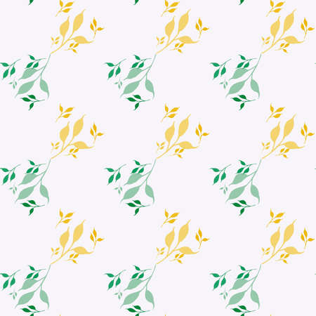 Yellow and green branches of leaves on a light background