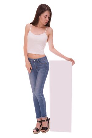 Asian woman holding blank poster isolated on white backroundの写真素材