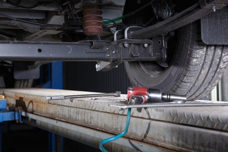 chassis of a car on the lift in body shopの写真素材