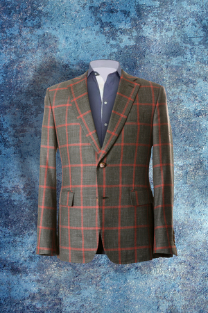 Stylish suit for man on mannequins or dummy at the modern shop boutique.の写真素材