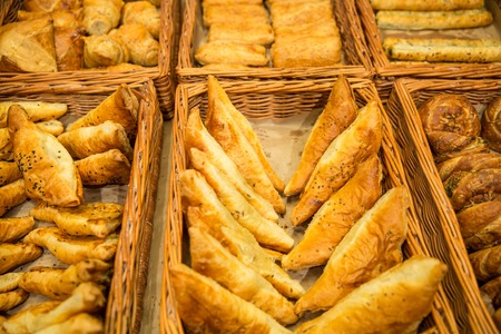 Various bread type on shelf in Bakery on counter at the store.の写真素材