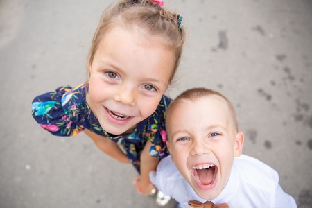 portrait of brother and sister outdoorの写真素材