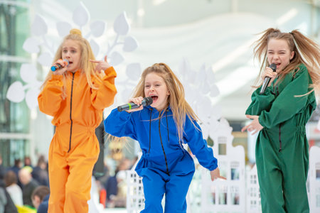 Kyiv, Ukraine March 03.2019. UKFW. Ukrainian Kids Fashion Day. A group of little girls singing or performing on stage or podiumのeditorial素材
