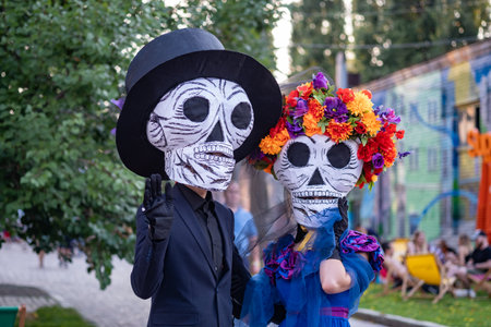 Kyiv, Ukraine, Santa Muerte Carnival, 20.07.2019. Dia de los Muertos, Day of the Dead. halloween. Man and woman Participants of the in death masksのeditorial素材