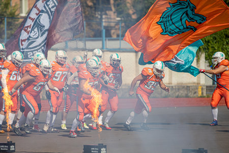 Start of the american football game. show with fire. teams entering the stadium. american football competitions Stallions Kyiv - Hurricanes Minsk 08.09.2019のeditorial素材