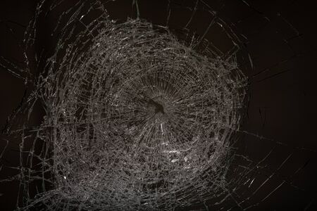 Bullet hole in glass