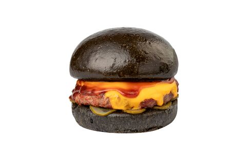Gourmet black burger with Spicy sauce with pickles and melted cheese isolated on white bacgroundの写真素材
