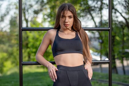 Pretty sporty girl workout outdoor on the sports ground. healthy lifestyle