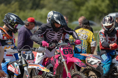 Ukraine, Kyiv, 06.06.2020. First step Golosievo-MX Pyrohiv-Kyiv Extreme Motocross MX Rider riding on dirt track. athletes children, juniors, men, womenのeditorial素材