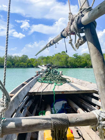 A front of old wooden boat on an ocean in Zanzibar. traveling to an exotic country