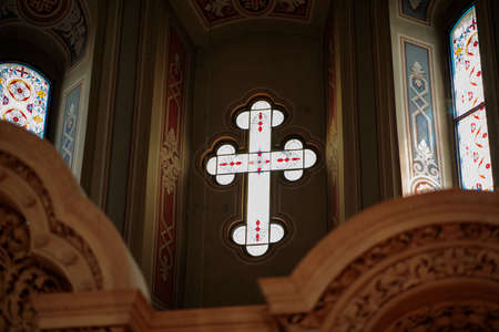 A stained glass rendition of a cross.の写真素材