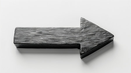 Black wooden arrow symbol on white backgroundの素材