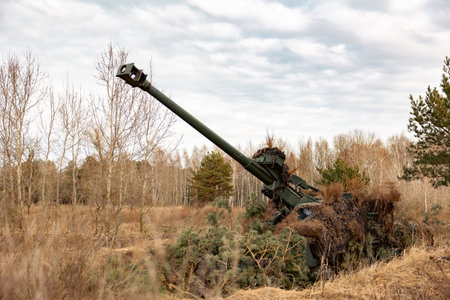 Modern Camouflaged Self-Propelled Artillery Mount. The use of military equipment on the battlefieldの写真素材