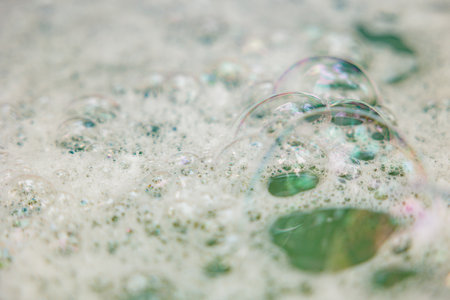Detergent foam bubble on water. Soap sudsの写真素材