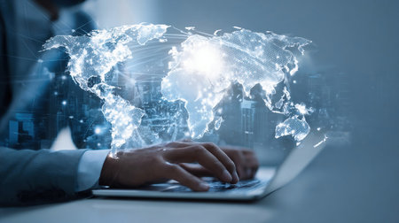 Digital technology, internet global network communication technology concept. Business man using laptop computer with global internet network connection, smart city as background, data exchangeの素材