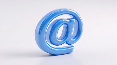A chrome-plated AT symbol isolated on a white background. Email sign isolated on white. Blue At sign mail iconの素材