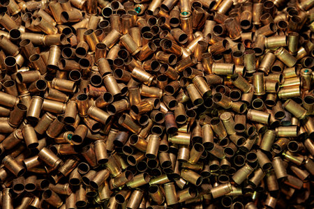 Lots of spent pistol casings background