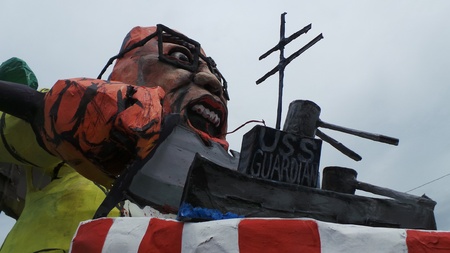 Effigy of Pres. Aquino as puppet of the US is paraded during the anti-state of the nation address protest held in Quezon City.のeditorial素材