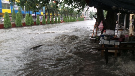 Flooding in Quezon City despite of drainage repair  Overflowing drainage canal after almost an hour of heavy downpour in Quezon Cityのeditorial素材