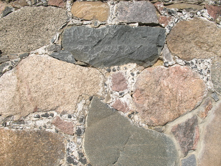 background from stones. laying. densely driven squared stonesの写真素材