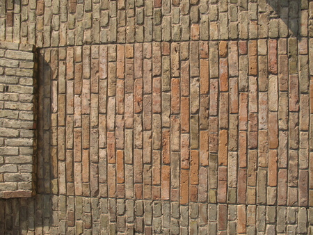 background from stones. laying. densely driven squared stonesの写真素材