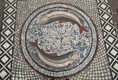 Religious christian mosaic with two fishesの写真素材