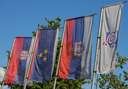 Serbian and Vojvodina and Electric company waving on pillarの写真素材