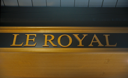 Elegant indoor logo Le Royal at wooden sealingの写真素材
