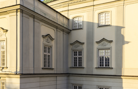 The area of ??the Old Town in city Warsaw, Poland. South Baroque facade of the Palace "under the copper roof" in winter. Windows and doors.のeditorial素材