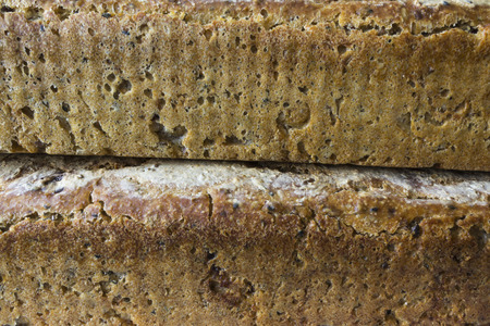 Two loaves of homemade bread. Polish cuisine. Brown bread of rye as a background for a web page.の写真素材
