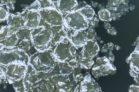 Ice floes floating on the river. Top view. Vistula River in Poland.の写真素材