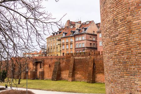 The area of the Old Town in Warsaw, Poland . The city's medieval wall and old houses.の写真素材