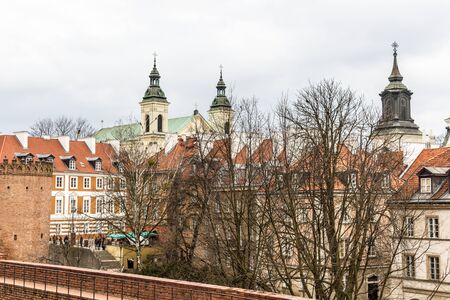 The area of the Old Town in Warsaw, Poland . Medieval houses and towers of churches.のeditorial素材